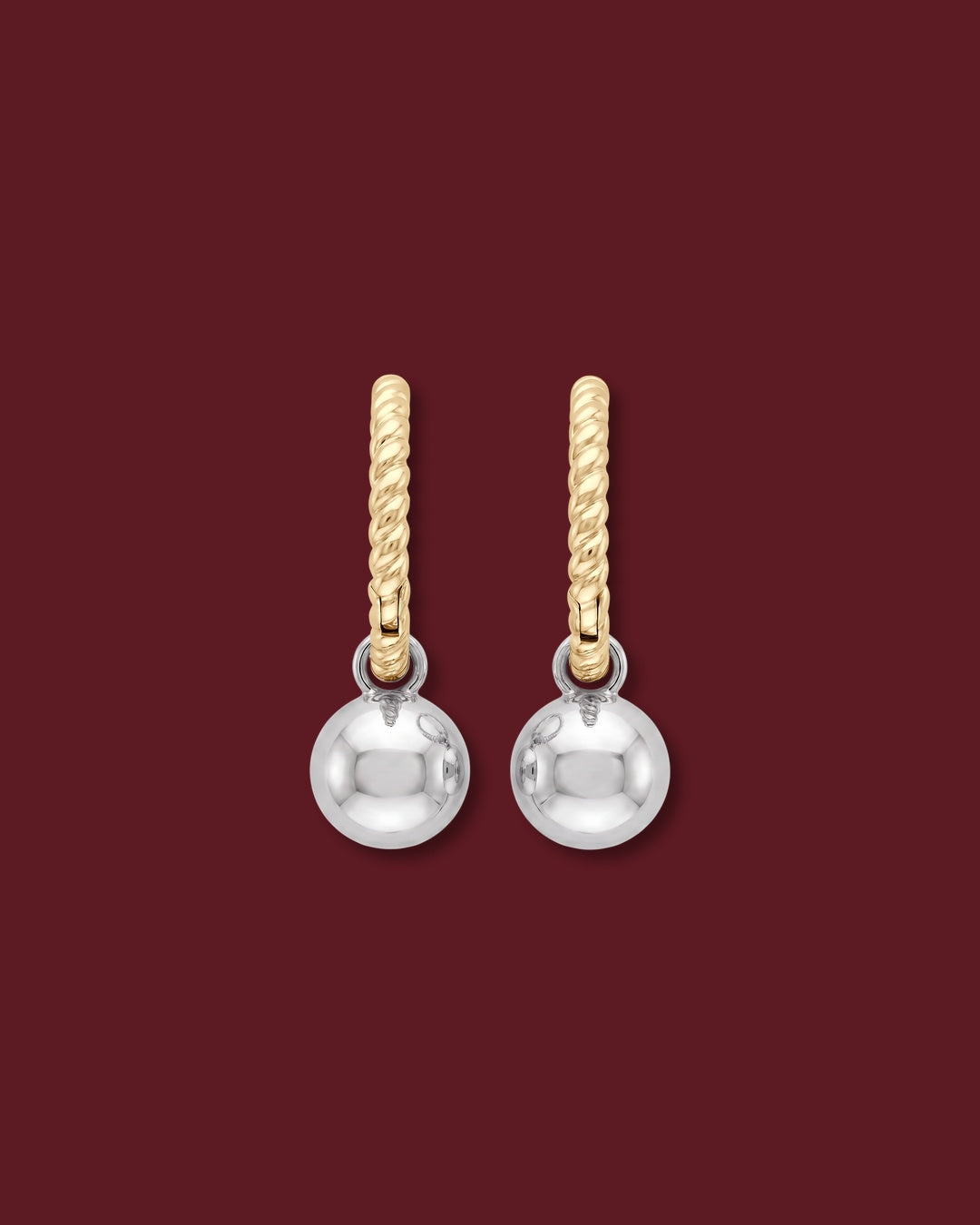 Back of the CHANTAL charm, a polished 14K white gold ball, on a 14K yellow gold twisted huggie