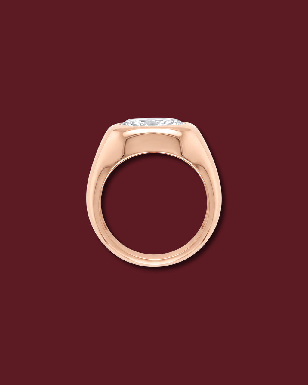 Rose gold THALIA signet ring seen in profile, showing the marquise flush in the dome