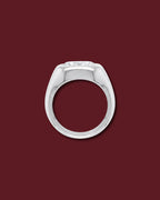 White gold THALIA signet ring seen in profile, showing the marquise flush in the dome